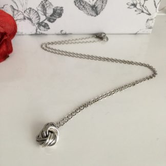 stainless-steel-and-silver-infinity-love-knot-ball-necklace