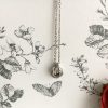stainless-steel-and-silver-infinity-love-knot-ball-necklace