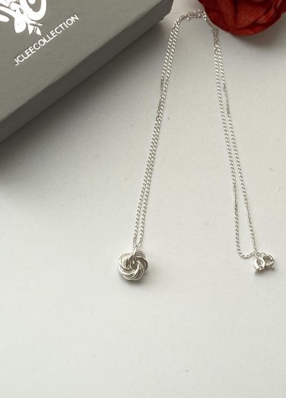 silver-rosette-swirl-pendant-necklace